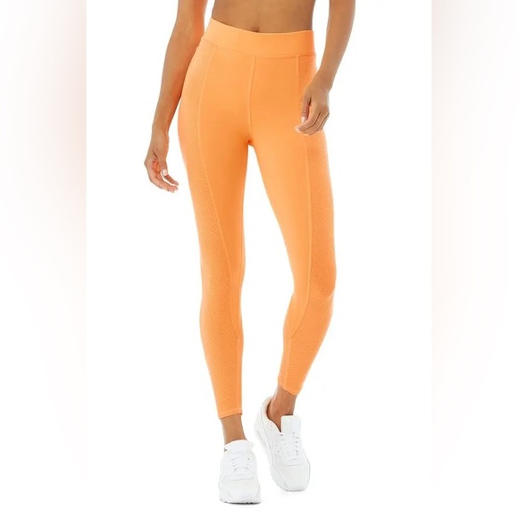 ALO YOGA 
High-Waist 7/8 No Limit Legging - Neon Apricot - Picture 1 of 2